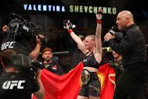 Valentina Shevchenko celebrates after defeating Jessica Eye during their women's flyweight titl ...