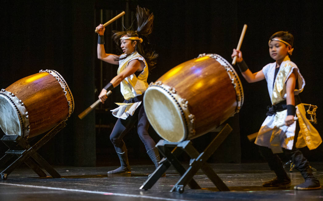 Jen Kong and Elijah Rondez, 9, with Korabo perform the traditional Japanese art form of taiko f ...