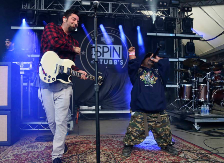 FILE - In this March 18, 2016, photo Bushwick Bill, right, joins Deftones' Chino Moreno onstage ...