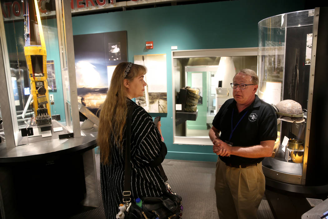 Executive Director Michael Hall of the National Atomic Testing Museum in Las Vegas, right, talk ...