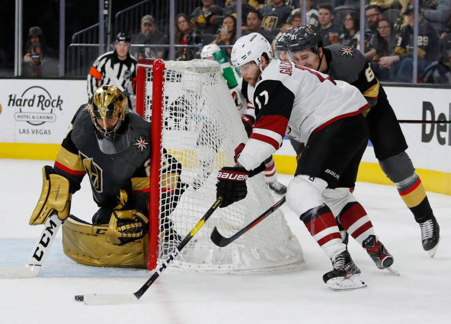 Arizona Coyotes center Alex Galchenyuk (17) attempts a wraparound shot against Vegas Golden Kni ...