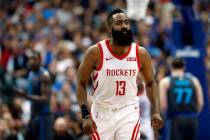 Houston Rockets' James Harden looks at his bench during an NBA basketball game against the Dall ...