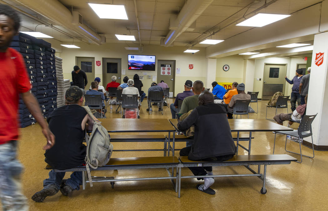 Clients relax in the day room at The Salvation Army, which offers a summer day shelter opened f ...