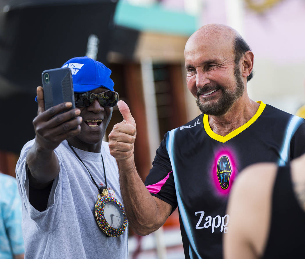 Entertainer Flavor Flav, left, records video with attorney Ed Bernstein ahead of the Lights FC ...
