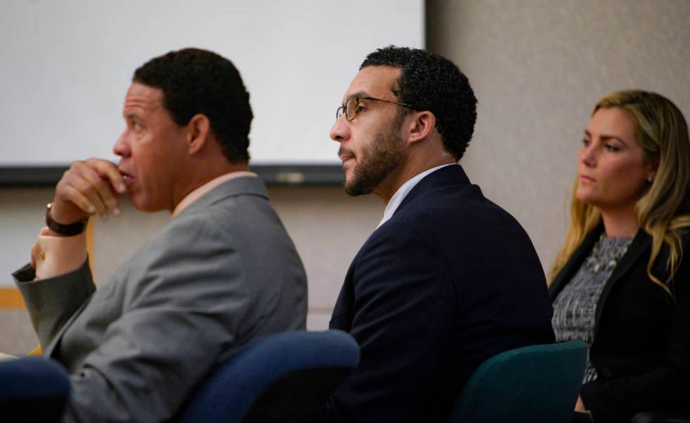 Sitting in Superior Court in Vista, Kellen Winslow, Jr., is flanked by two of his three defense ...