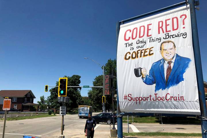 A sign supporting Springfield meteorologist Joe Crain appears at Grab a Java, a drive-through c ...