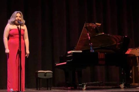 Maria “Masha” Pisarenko introduces one of the acts in the "From Russia with Love" concert a ...