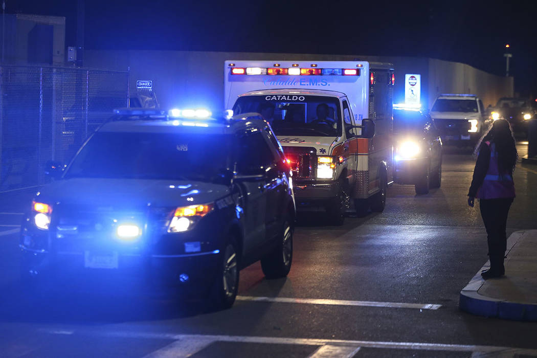 An ambulance carrying David Ortiz is escorted to Mass General Hospital in Boston Monday night, ...