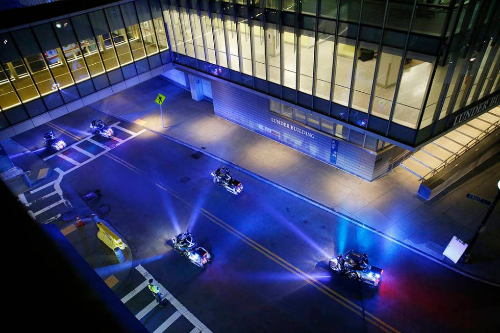 A police motorcade for the ambulance carrying David Ortiz arrives at Mass General Hospital in B ...