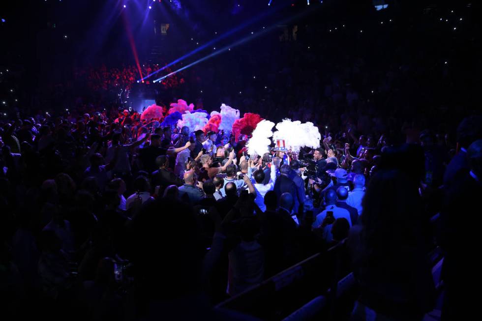 Tyson Fury makes his way to the ring for his fight against Tom Schwarz in the lineal heavyweigh ...