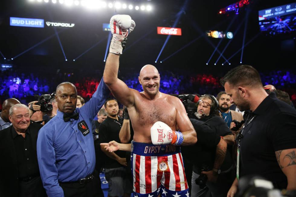 Tyson Fury celebrates his win against Tom Schwarz in the lineal heavyweight bout at the MGM Gra ...