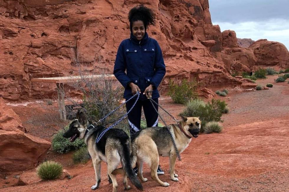 Ines Diaz takes a photo with her two German shepherds, Tyger and Aria. (GoFundMe)