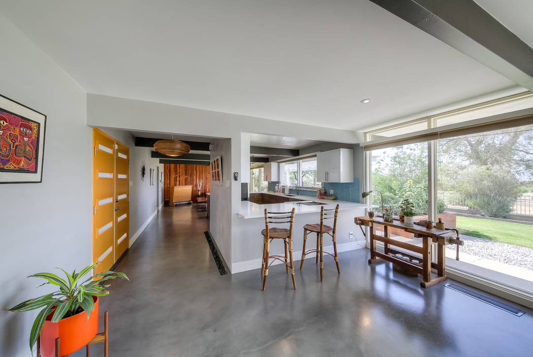 There is bar seating off the kitchen. (Realty One Group)