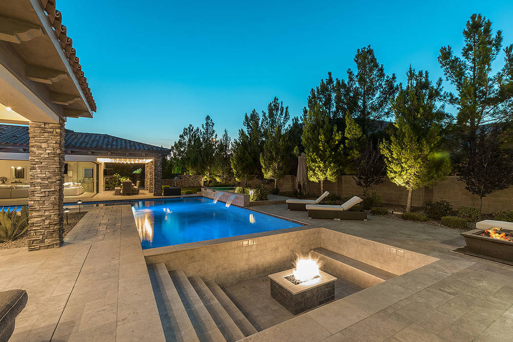 The backyard has a fire pit. (Ivan Sher Group)