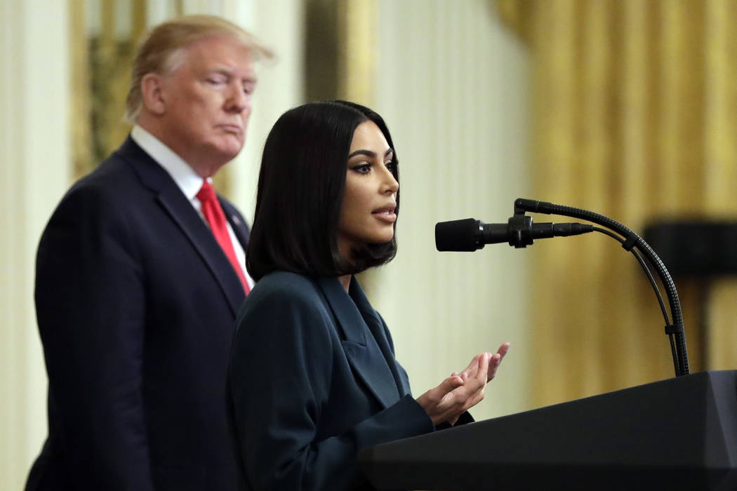 President Donald Trump listens to Kim Kardashian West, who is among the celebrities who have ad ...