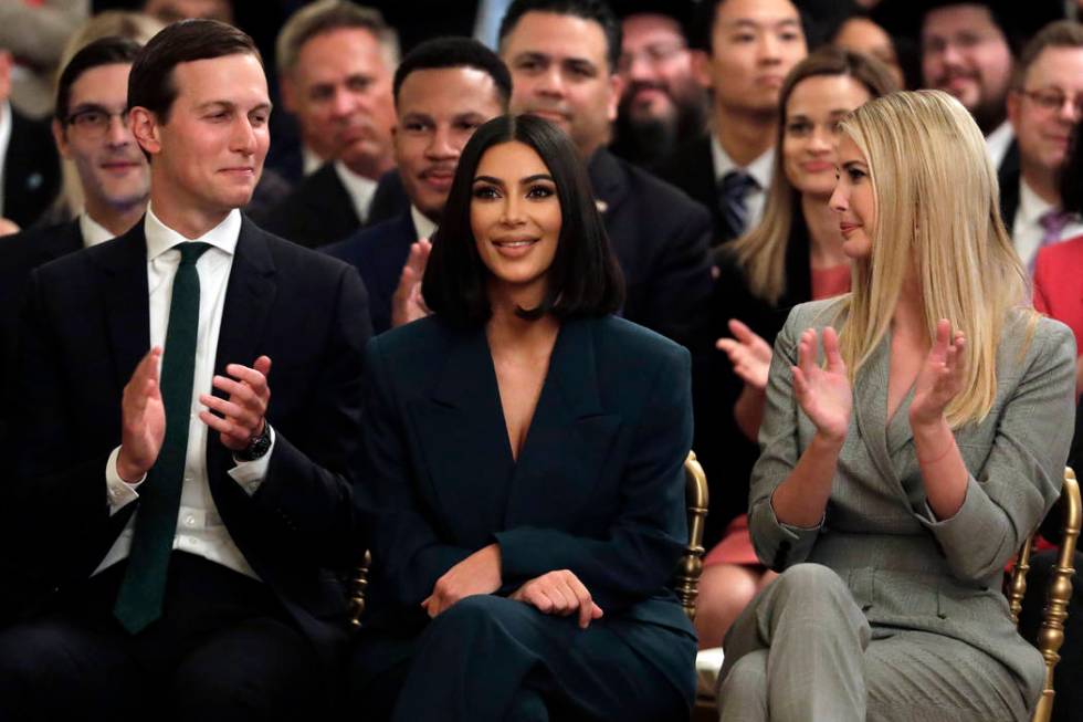 White House senior adviser Jared Kushner and Ivanka Trump, right, sit with Kim Kardashian West, ...