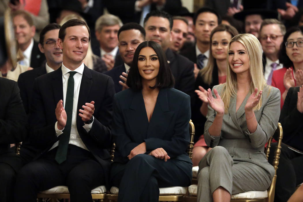 White House senior adviser Jared Kushner and Ivanka Trump, right, sit with Kim Kardashian West, ...