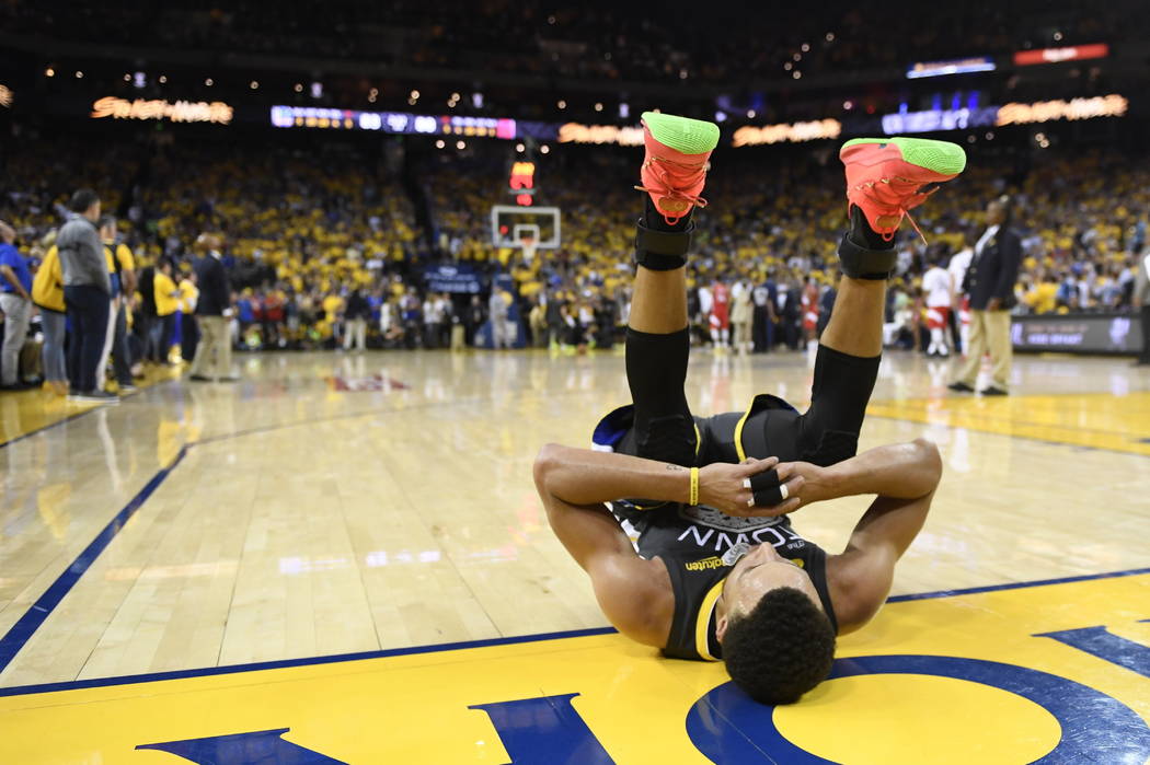 Golden State Warriors guard Stephen Curry reacts after teammate Klay Thompson was injured durin ...