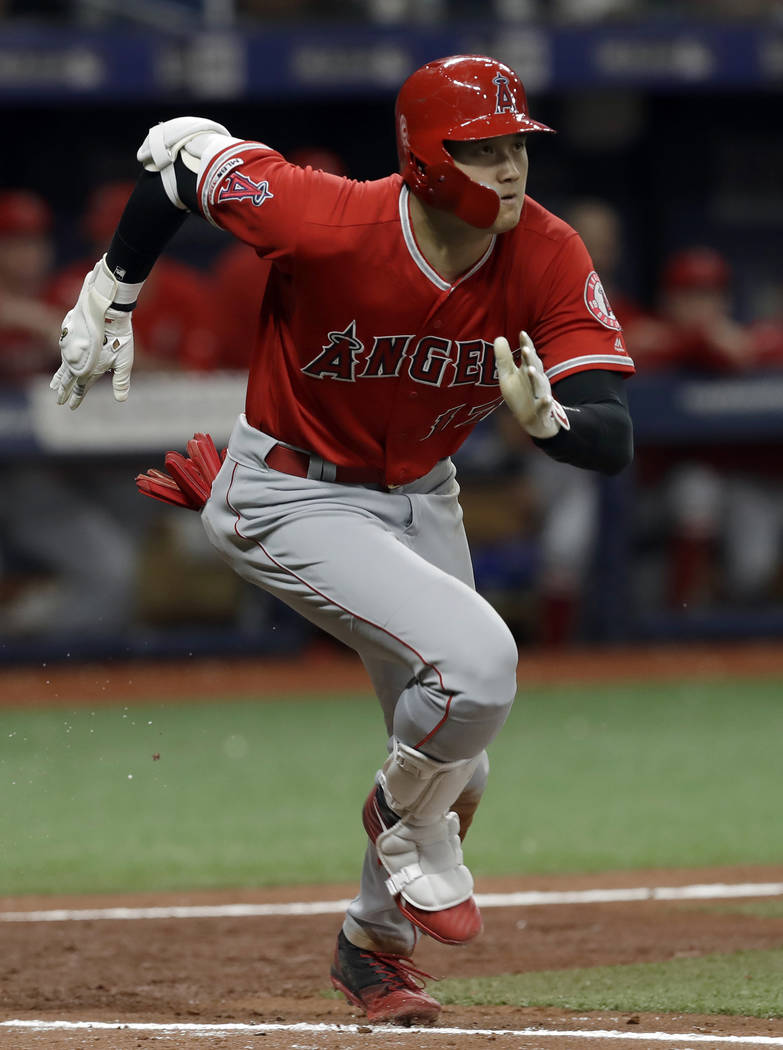 Los Angeles Angels' Shohei Ohtani, of Japan, runs to first with a triple off Tampa Bay Rays' Ry ...