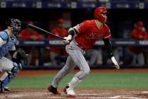 Los Angeles Angels' Shohei Ohtani, of Japan, watches his triple off Tampa Bay Rays' Ryan Yarbro ...
