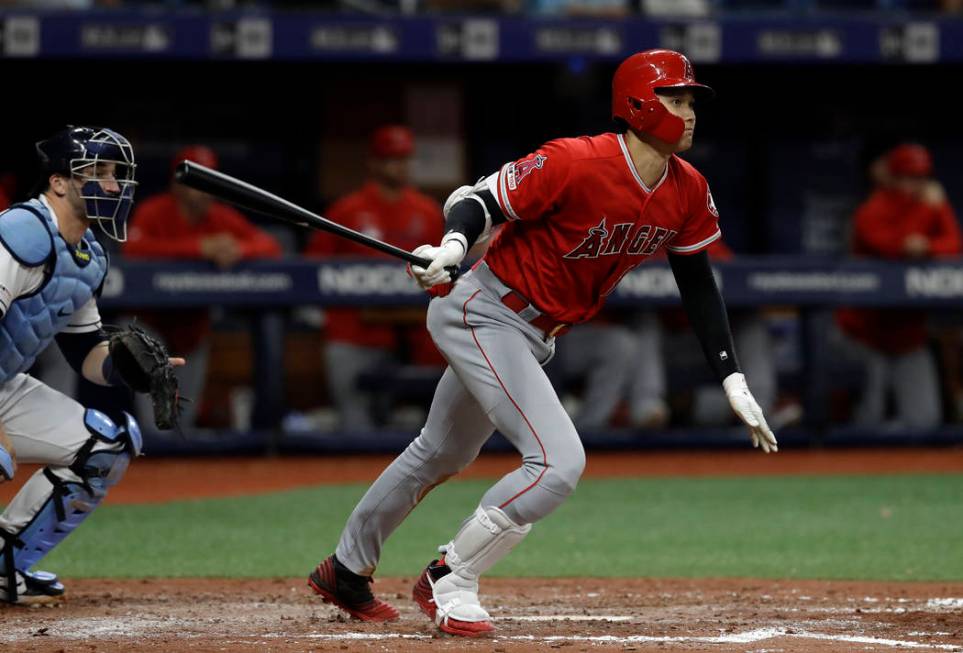 Los Angeles Angels' Shohei Ohtani, of Japan, watches his triple off Tampa Bay Rays' Ryan Yarbro ...
