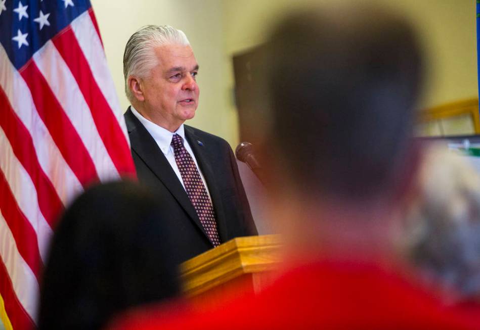 Gov. Steve Sisolak speaks before signing a trio of bills, including AB291, which includes a var ...