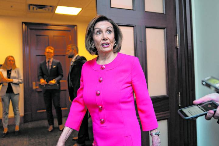 Speaker of the House Nancy Pelosi, D-Calif., arrives for a closed-door meeting with her Democra ...