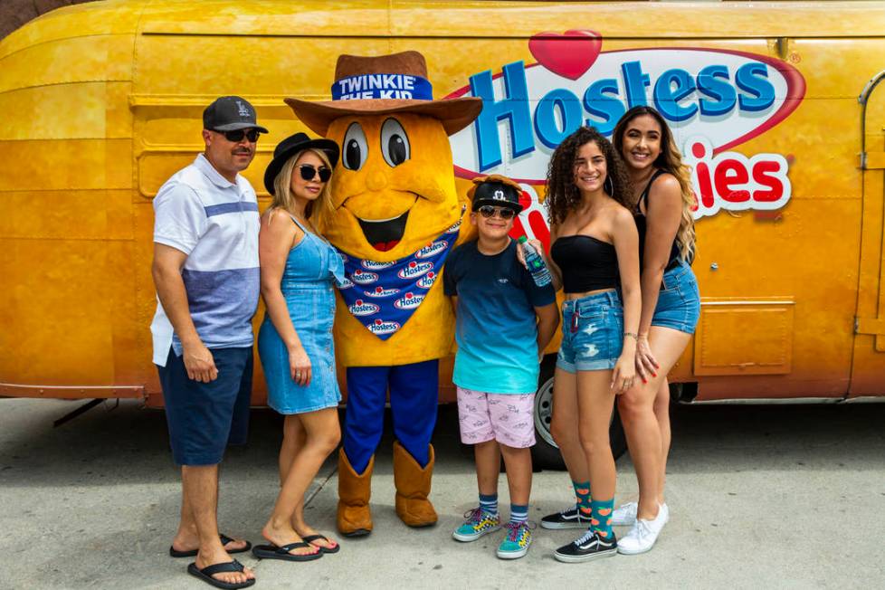 Twinkie the Kid poses with a family of Los Angeles while on a stop at the Hoover Dam in celebra ...