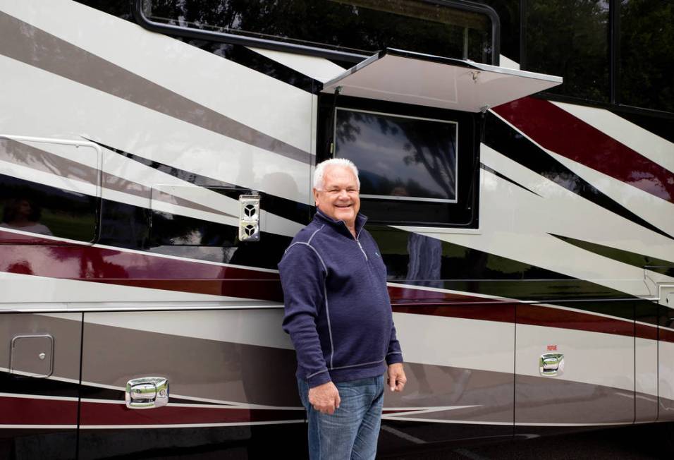 Roger Wagner shows off the exterior flat-panel TV. The exterior also features dual-pane tinted ...