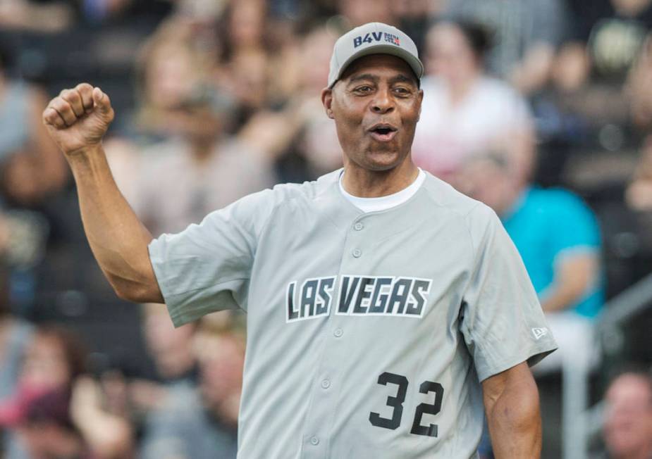 Former Oakland Raiders running back Marcus Allen fires up his team during the Battle For Vegas ...