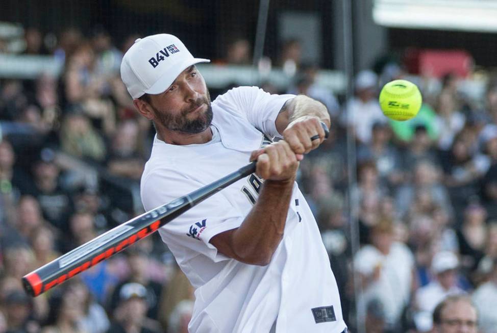 Golden Knights defenseman Deryk Engelland takes a swing during the home run derby at the Battle ...