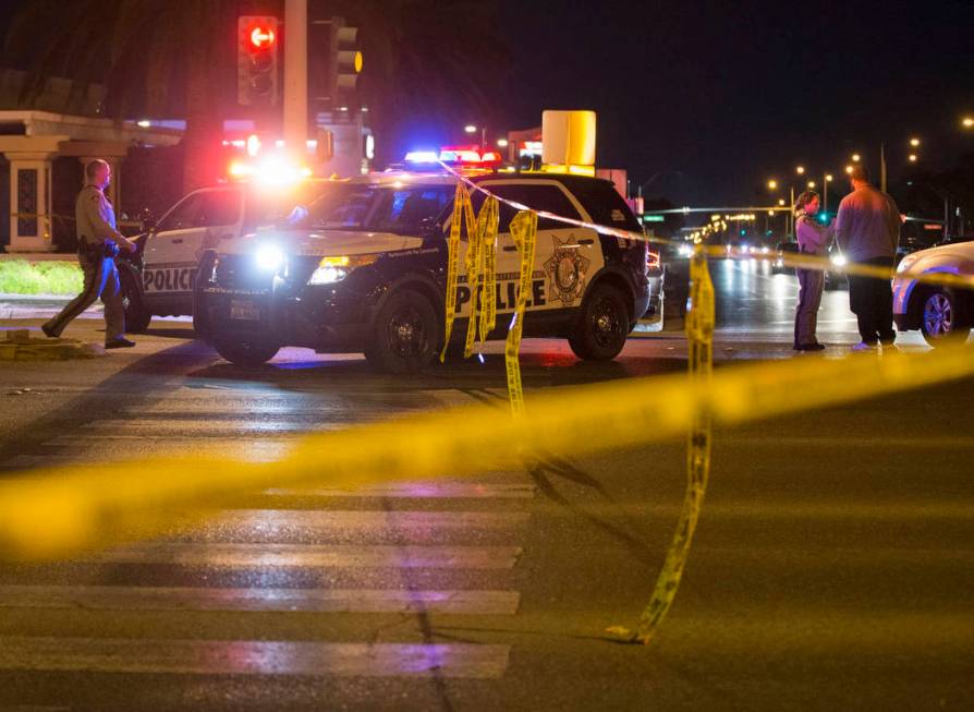 Las Vegas police investigate an officer-involved shooting in the area of West Sahara Avenue and ...