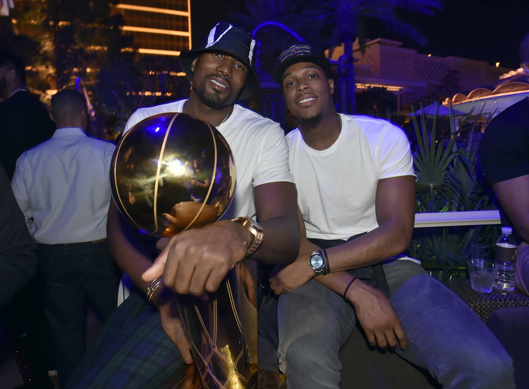 LAS VEGAS, NEVADA - JUNE 14: Serge Ibaka (L) and Kyle Lowry of the Toronto Raptors celebrate th ...