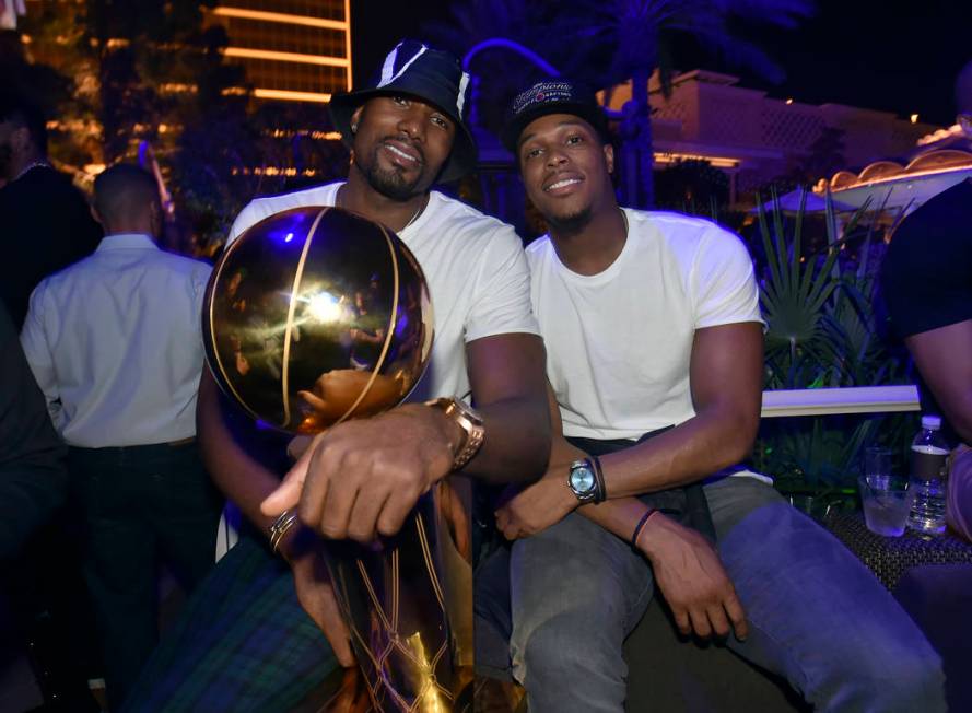 LAS VEGAS, NEVADA - JUNE 14: Serge Ibaka (L) and Kyle Lowry of the Toronto Raptors celebrate th ...