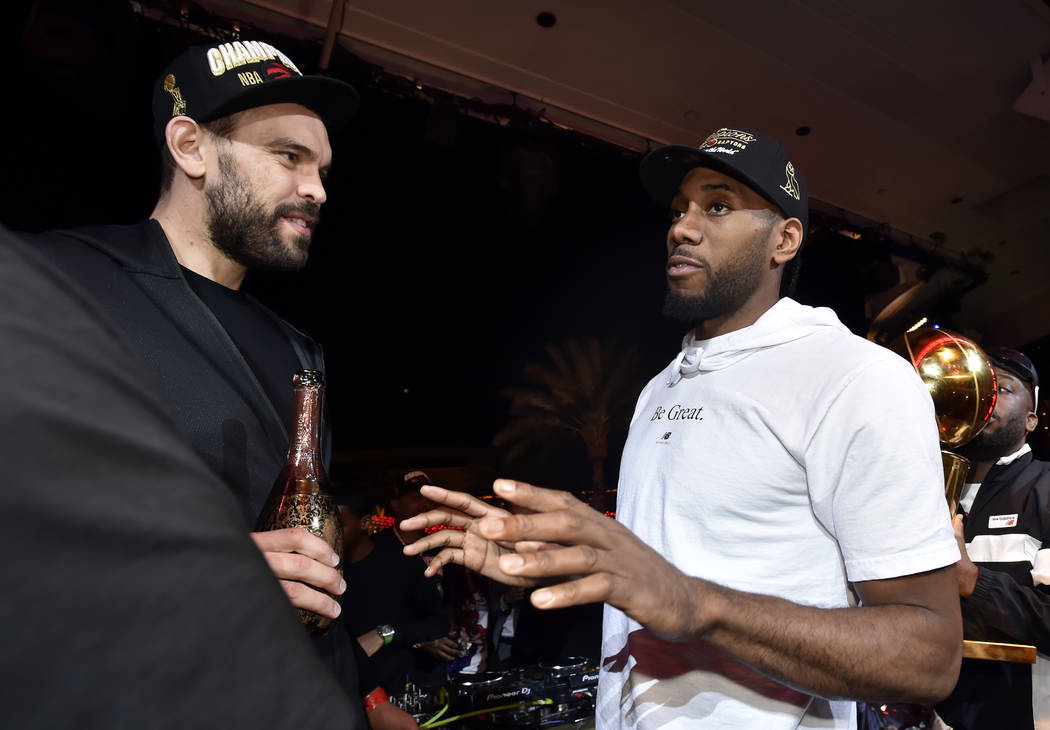 LAS VEGAS, NEVADA - JUNE 14: Marc Gasol (L) and Kawhi Leonard of the Toronto Raptors celebrate ...