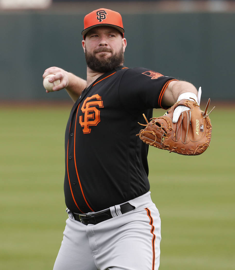 San Francisco Giants catcher Cameron Rupp works out during a baseball spring training practice, ...