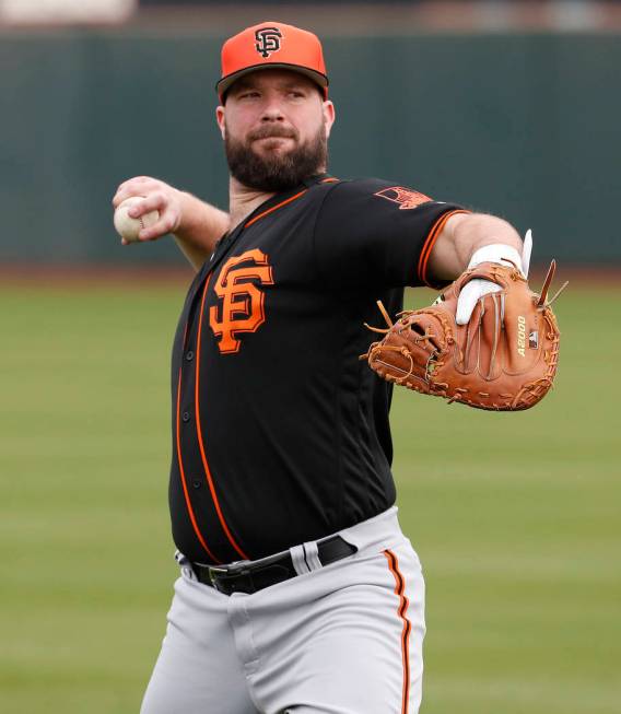 San Francisco Giants catcher Cameron Rupp works out during a baseball spring training practice, ...