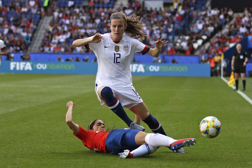 United States' Tierna Davidson, top, vies for the ball with Chile's Elisa Duran during the Wome ...