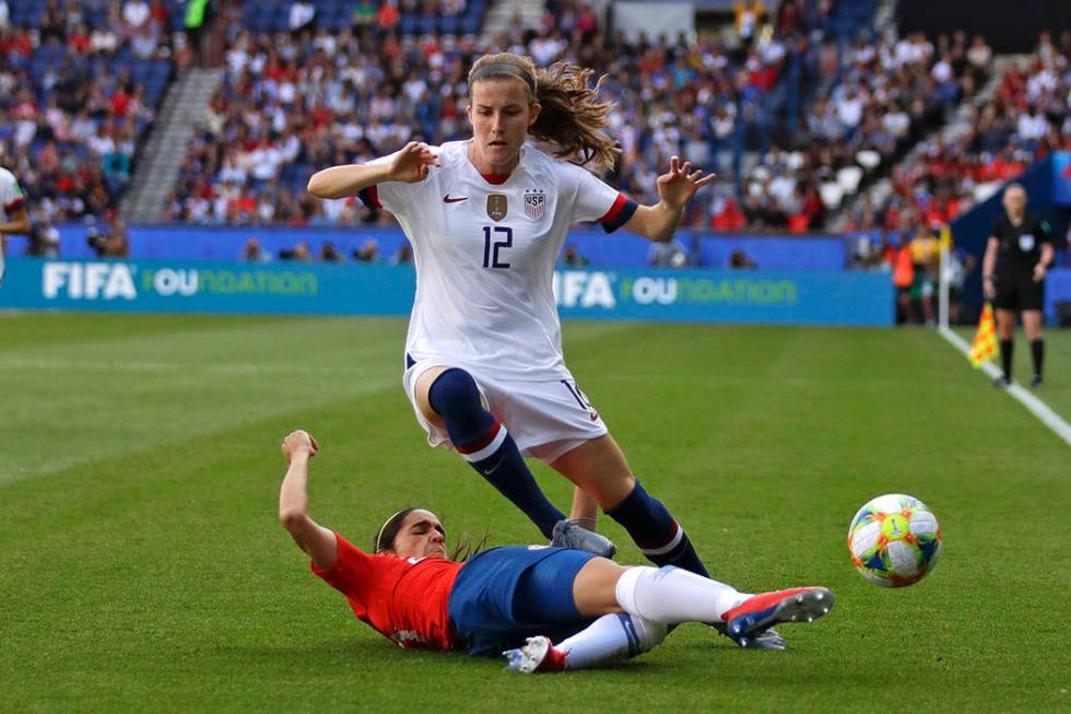 United States' Tierna Davidson, top, vies for the ball with Chile's Elisa Duran during the Wome ...