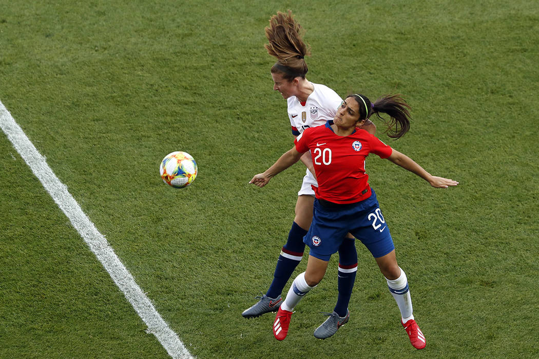 United States' Tierna Davidson jumps for the ball with Chile's Daniela Zamora, right, during th ...