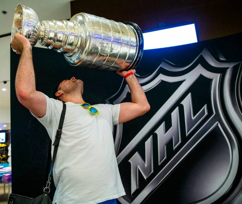 St. Louis Blues left wing Patrick Maroon lifts the Stanley Cup, the most recognizable and rever ...