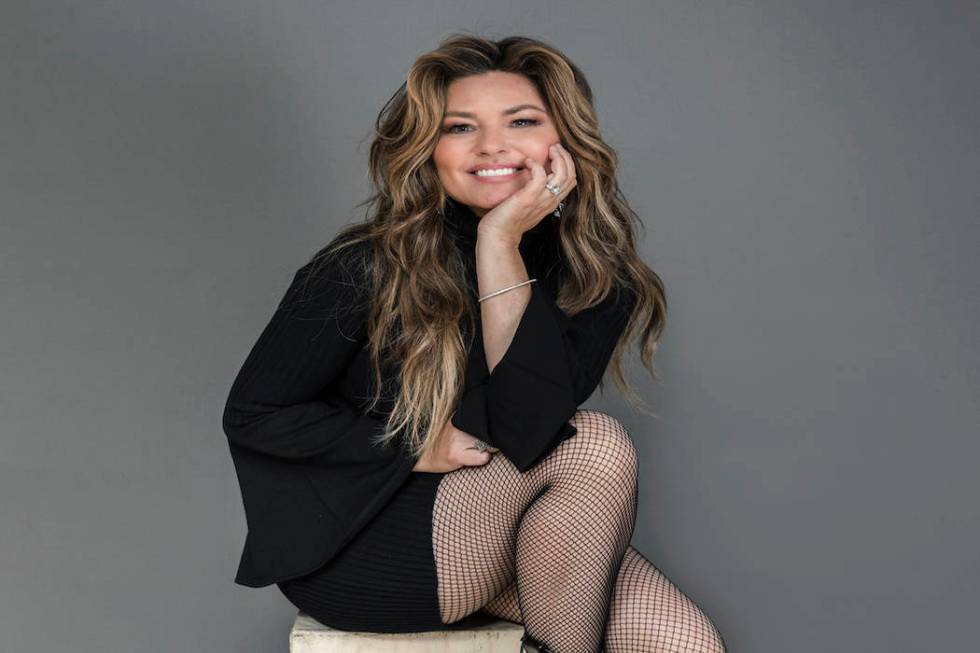 Shania Twain poses for a portrait at her Manhattan hotel, Friday, June 14, 2019, in New York. T ...