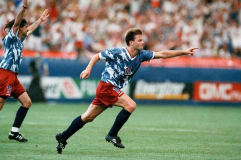 United States national team forward Eric Wynalda, right, reacts after he scored against Switzer ...