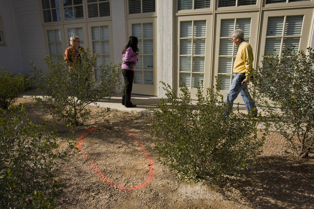 A paint outline marks the spot on Jan. 5, 2010, where Johnny Lee Wicks was shot and killed on J ...