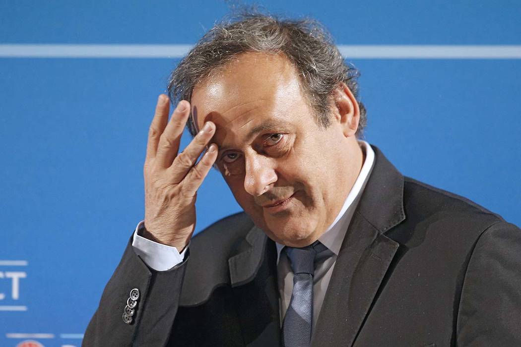 In a Feb.22, 2014, file photo, UEFA President Michel Platini arrives at a press conference in N ...