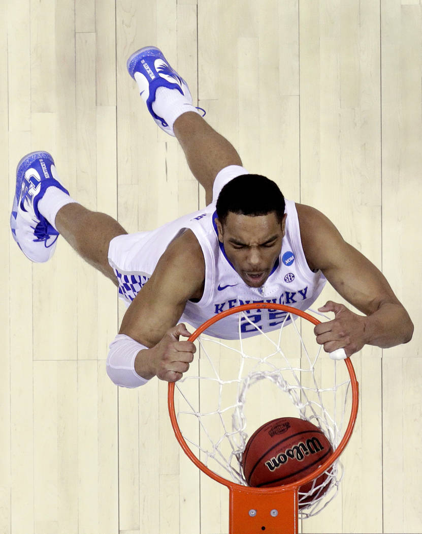 FILE - In this March 31, 2019, file photo, Kentucky's PJ Washington dunks the ball during the s ...