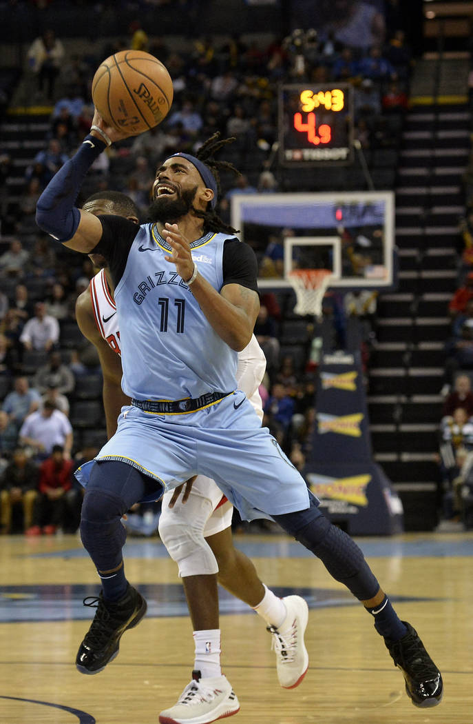 In this Feb. 27, 2019, file photo, Memphis Grizzlies guard Mike Conley (11) shoots the ball in ...