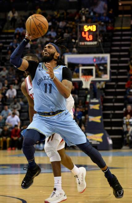 In this Feb. 27, 2019, file photo, Memphis Grizzlies guard Mike Conley (11) shoots the ball in ...