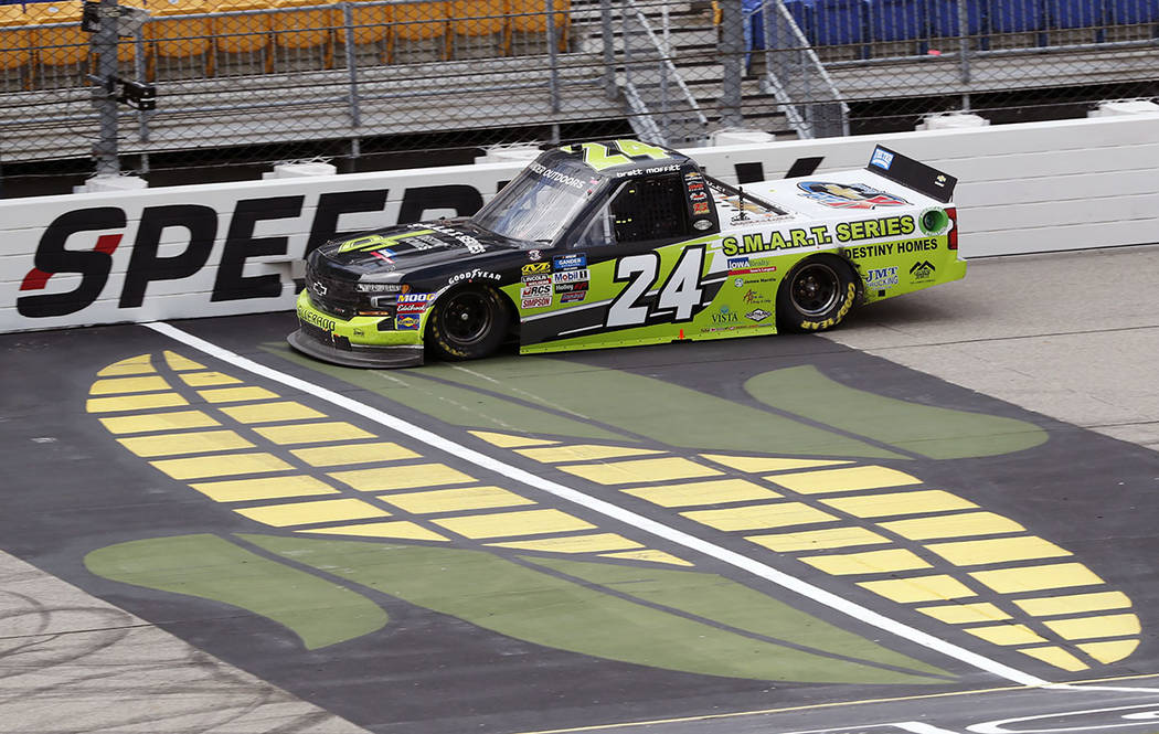 Brett Moffitt races his truck during the NASCAR Truck Series auto race, Sunday, June 16, 2019, ...