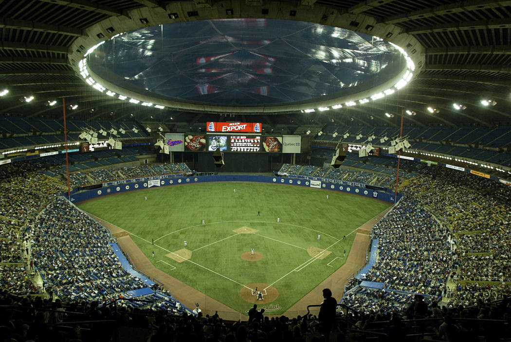 In this Sept. 29, 2004, file photo, fans watch a baseball game between the Montreal Expos and F ...